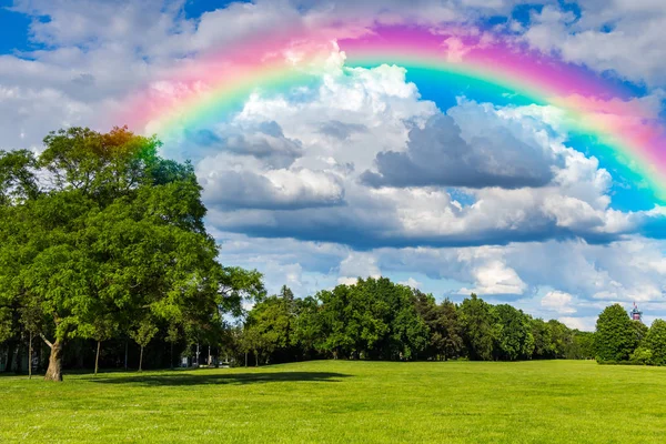 Bright rainbow in sky — Stock Photo, Image
