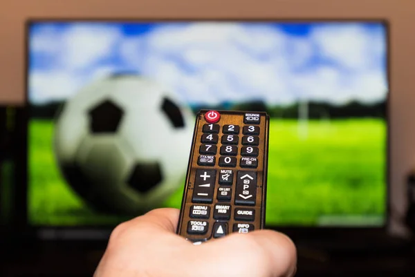 watching soccer game on modern tv