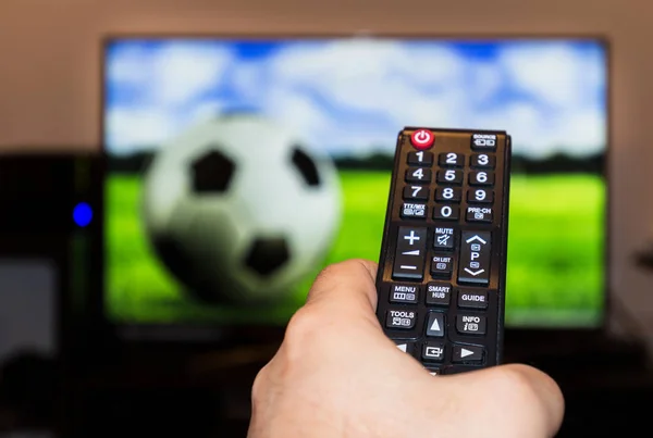 watching soccer game on modern tv