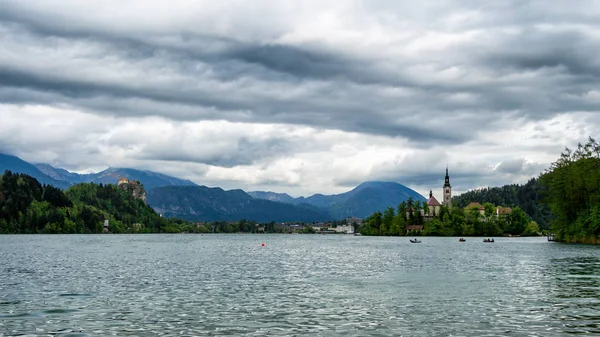 Amazing View On Bled Lake, Island, Church And Castle With Mountai — стоковое фото