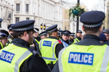 London, UK - 1st April, 2017. Police trying to keep in order pro clipart
