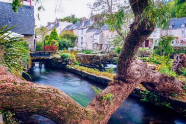 Idyllic scenery at Pont-Aven, a commune in the Finistere departm clipart