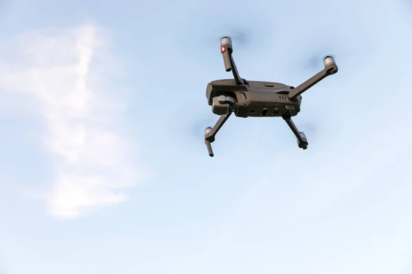 Drone flying over landscape. UAV drone copter flying with digita