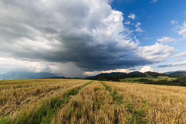 Stormy clouds in summer over a field in Slovakia — Stock Photo, Image