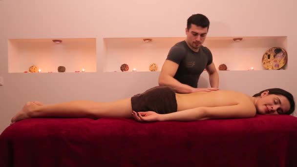 Man doing massage for girl — Stock Video