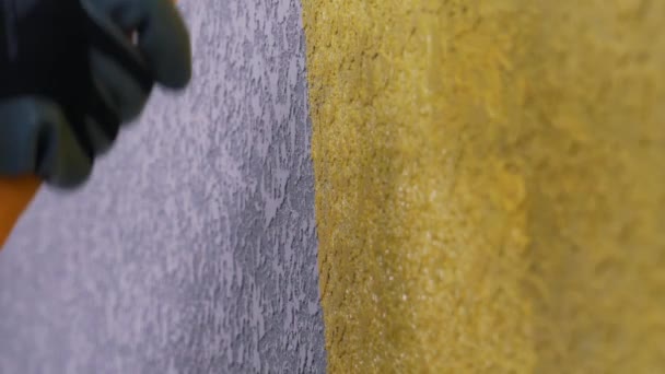 Paint the wall with a roller closeup — Stock Video