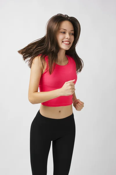 Genç spor kadın çalıştırmak seviyor.