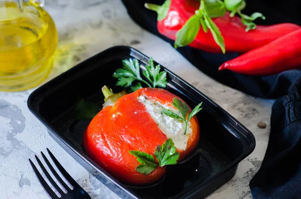 Healthy food and diet concept, restaurant dish delivery. Take away of fitness meal. Weight loss nutrition in boxes. Cottage cheese stuffed pepper