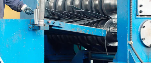 Machine for slitting / cutting / stripping steel sheets — стоковое фото