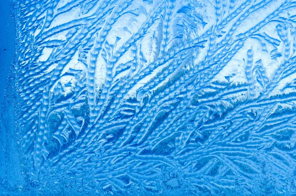 Beautiful frosty natural pattern on window glass — Stock Photo, Image