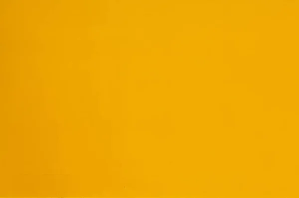 Superficie de fondo homogénea de color amarillo u ocre — Foto de Stock