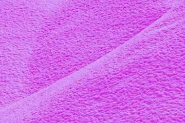 Arka plan olarak pembe renkli dokulu yüzeyi