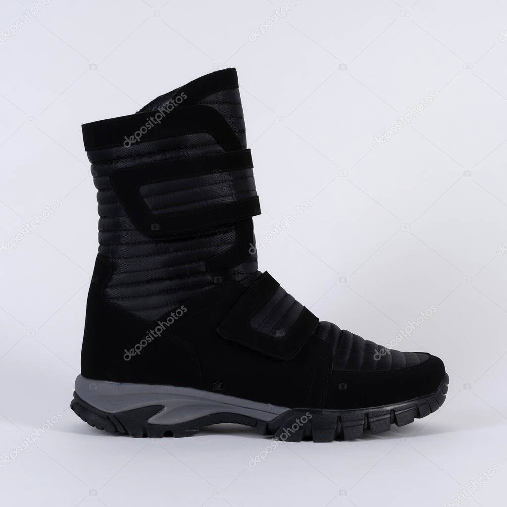  boot winter high warm soft waterproof on a fastener. On white background. 