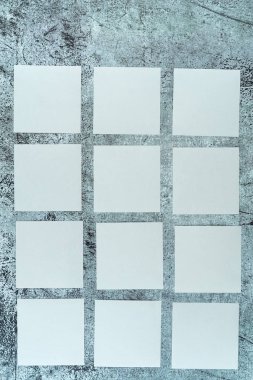 Mock up, calendar layout for 12 months consists notes same color on concrete wall background