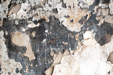 arkaplan siyah duvar yangından sonra soyuluyor