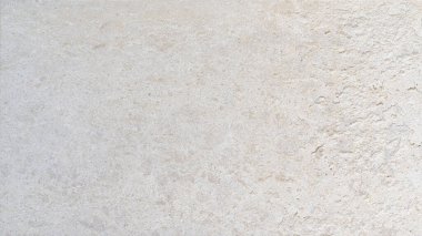 Kireç taşının beyaz arkaplan dokusu. Geniş ekran için soyut grafik.