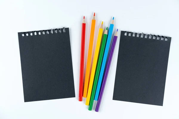 Dos Hojas Negras Cuaderno Lápices Colores Lgbt Sobre Fondo Blanco —  Fotos de Stock