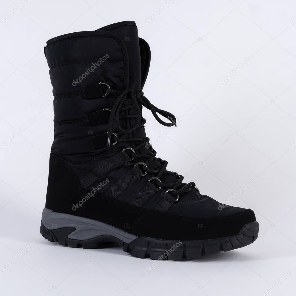 boot winter high warm soft waterproof lace up. On white background. 