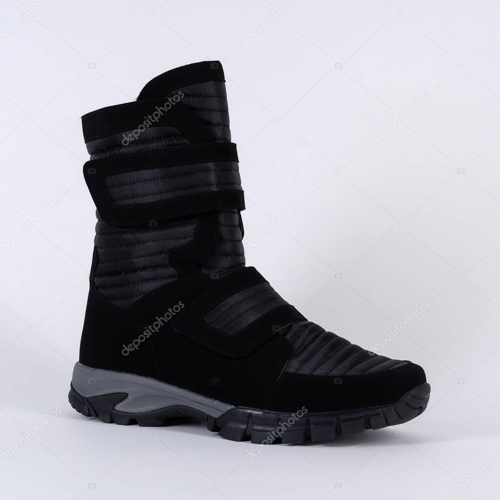  boot winter high warm soft waterproof on a fastener. On white background. 