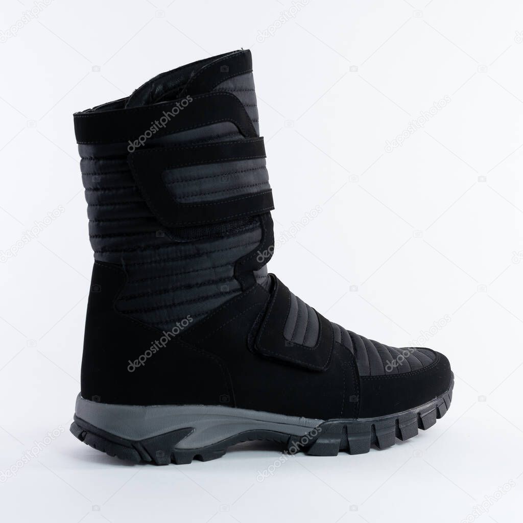 boot winter high warm soft waterproof on a fastener. On white background.  