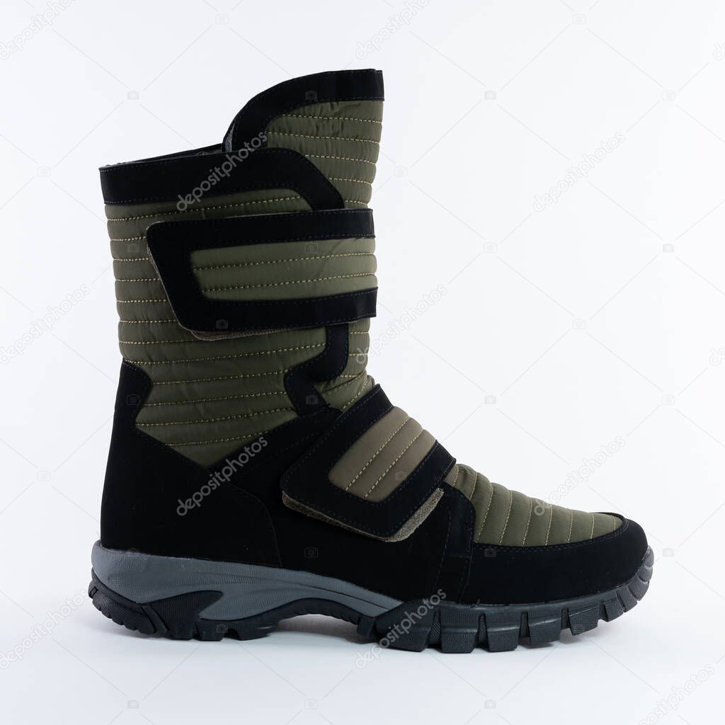 boot winter high warm soft waterproof on a fastener. On white background.