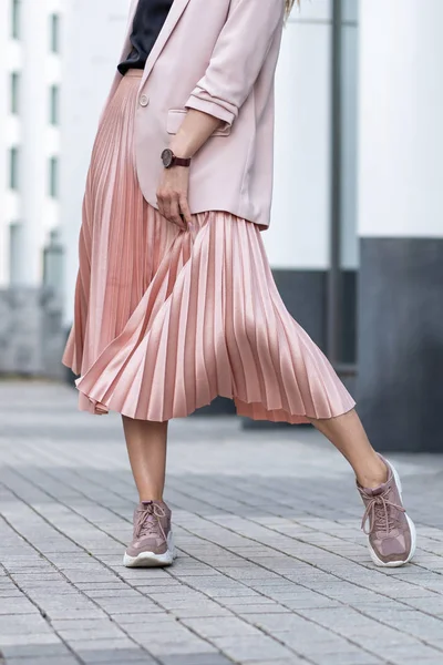 Peach colored A Line Pleated Skirt, sneakers