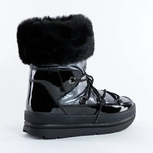 女性冬季黑色灰色专利皮革脚踝靴 鞋带白色背景 — 图库照片