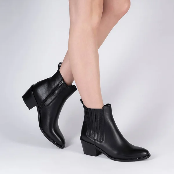 Black Leather Female High Heeled Ankle Boots Model Legs Shooting — ストック写真