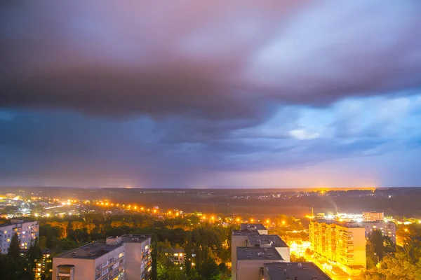 Evening in spring town with lights — Stock Photo, Image