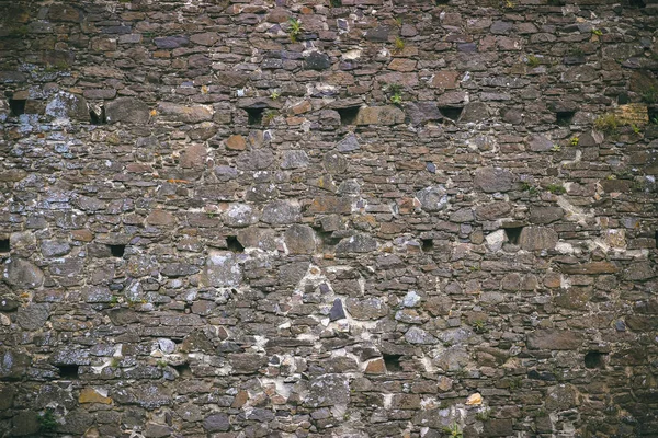 Het patroon van de bestrating van het steen. Graniet cobblestoned achtergrond. — Stockfoto