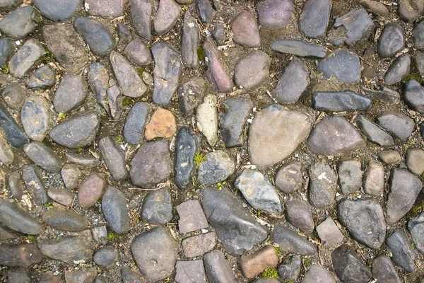 Каменная текстура тротуара. Гранитный булыжник . — стоковое фото