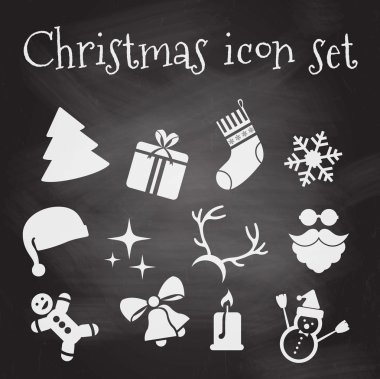 Bir kara tahta üzerinde Noel simgeler. Vektör çizim.