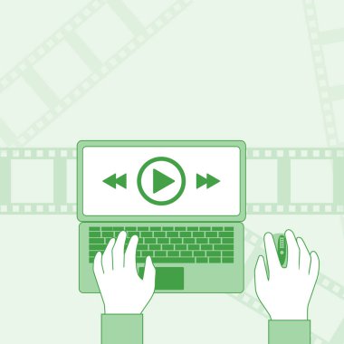 Bir dizüstü bilgisayarda bir video izlerken adam