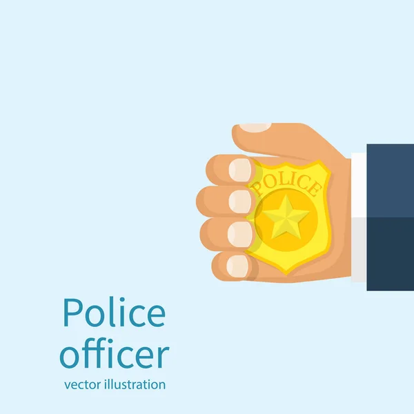 Politieman houdt badge in de hand. — Stockvector