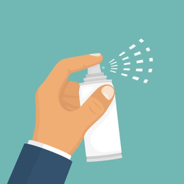 Elinde sprey. Sprey şişe.