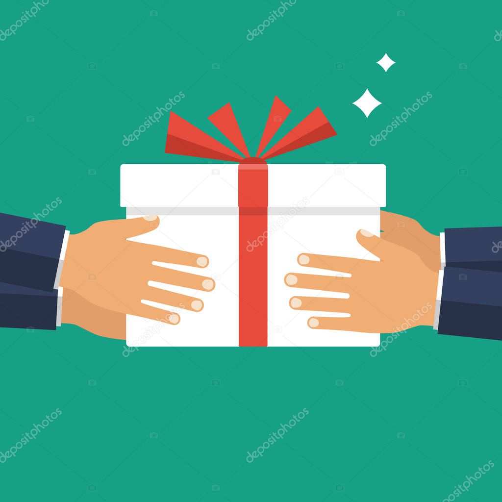 Give gift. Man holds white gift box with a red ribbon in hands