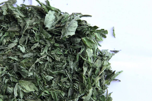 peppermint tea green leafs - dried peppermint on white