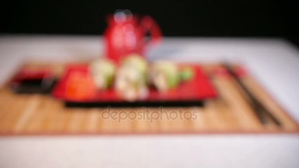 Japanese Green Sushi On Red Plate — Stock Video