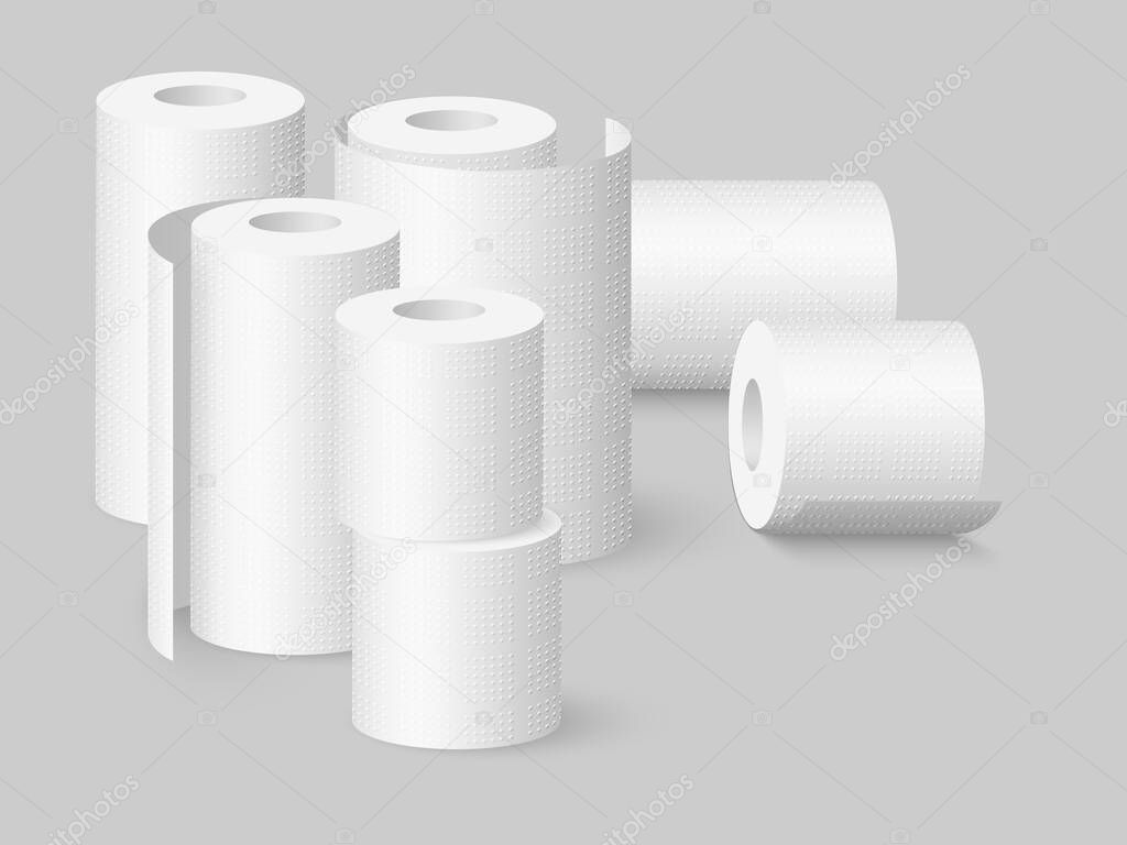 Set of kitchen towels and toilet paper rolls.