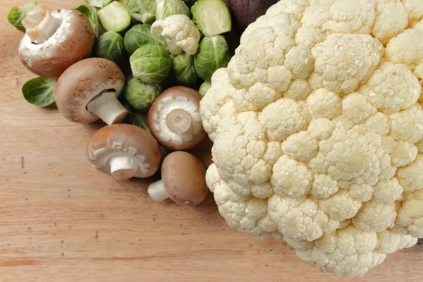 Cauliflower, mushrooms and brussels sprouts — Stock Photo, Image