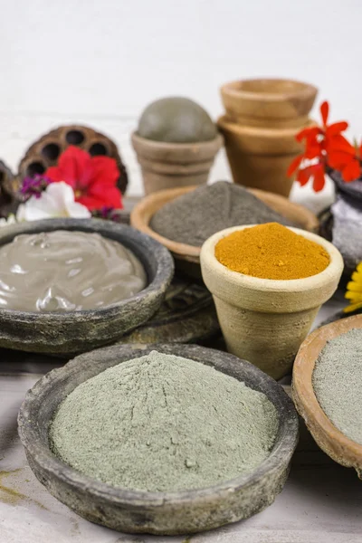 Ancient minerals - black, green, blue, ochre clay powder and mud — Stock Photo, Image