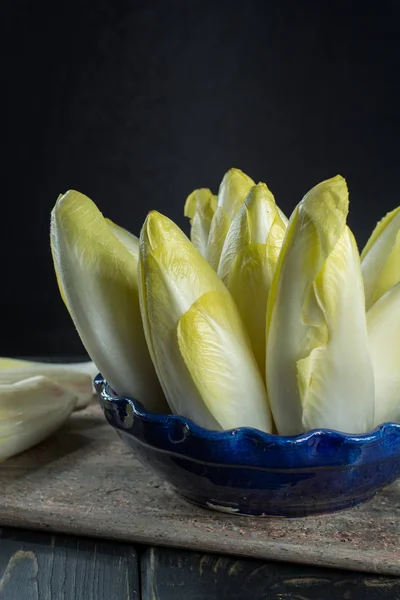 Fresh and healthy Chicory (witloof) Salad on a plate.