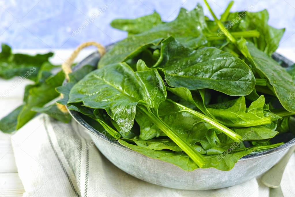 Fresh green Spinach leaves - diet and health concept