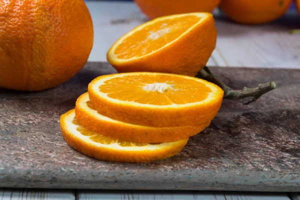 Giant ripe organic oranges from farm in Spain with leaves