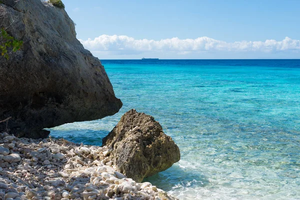 Rocks and clear blue water - swim paradise on tropical Curacao island, all seasons