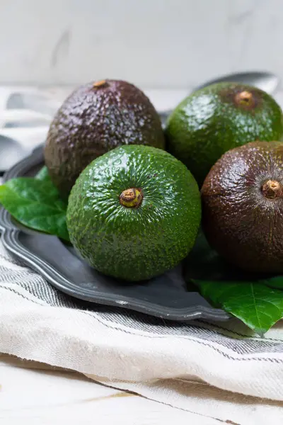 Green ripe avocado from organic avocado plantation - healthy food — Stock Photo, Image