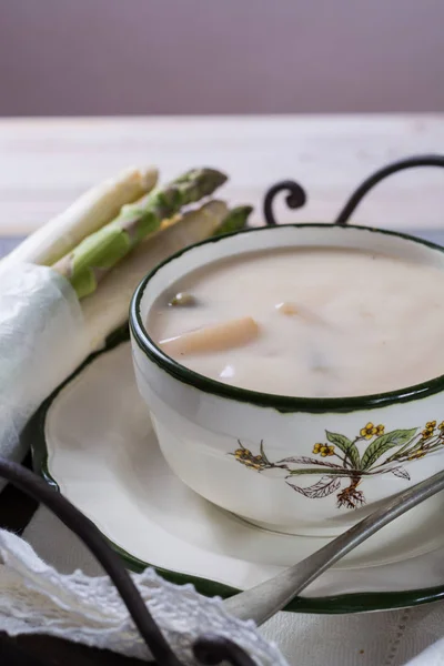 Spring season - white and green asparagus cream- soup, ready to eat