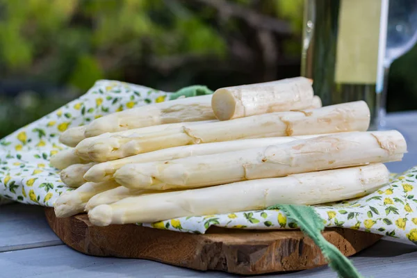 Spring food - fresh white big asparagus ready to cook on the tab