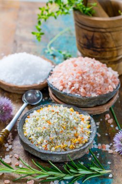 Gross sea salt mixed with dried red hot chili pepper, colorful seasoning close-up clipart