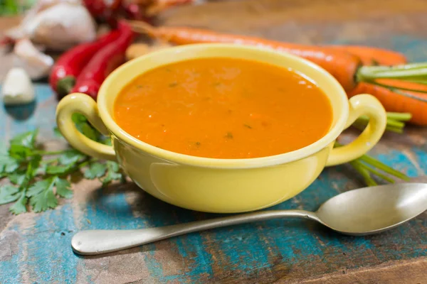 Spicy carrot soup with harissa made from hot chili pepper, lemon — Stock Photo, Image